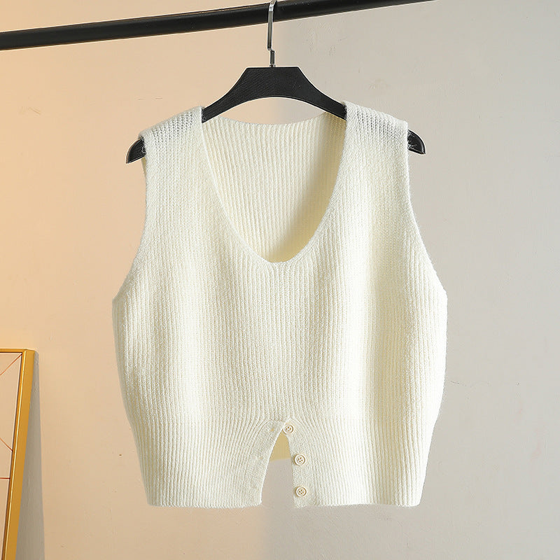 Layering A Sweater Over A Waistcoat And Wearing A Slit V neck Knitted Vest